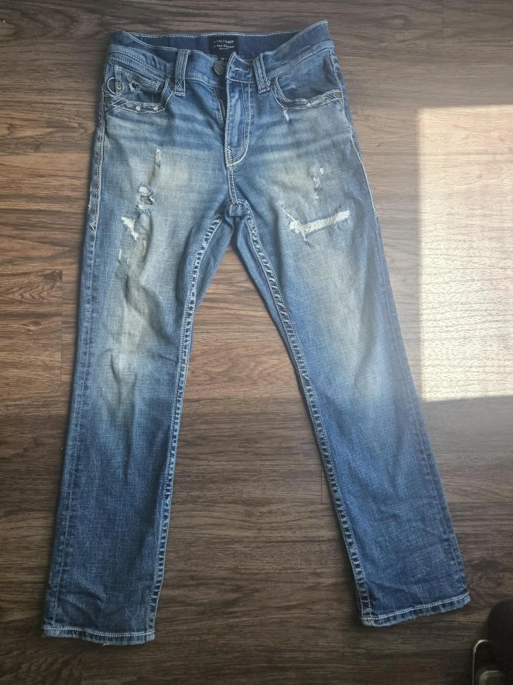 Distressed Blue Denim Jeans